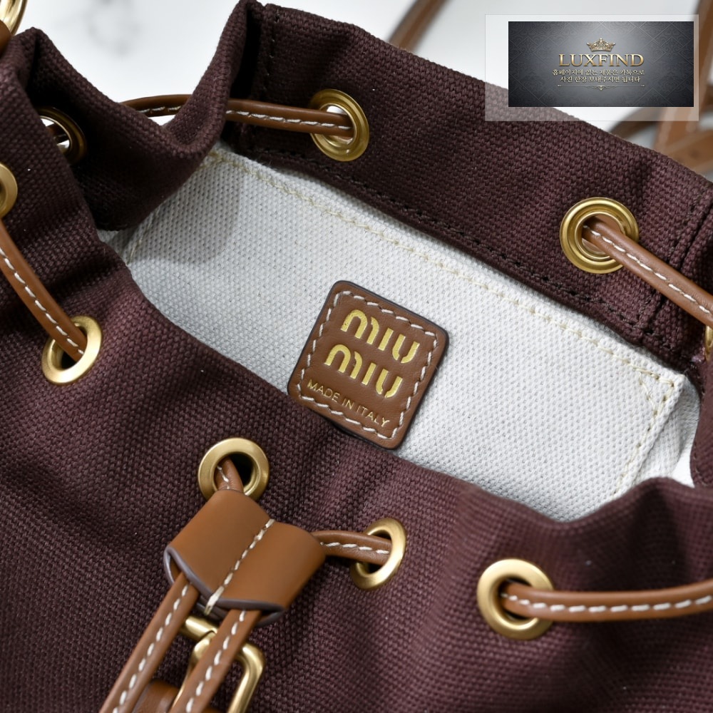 Miu Miu Canvas And Leather Backpack